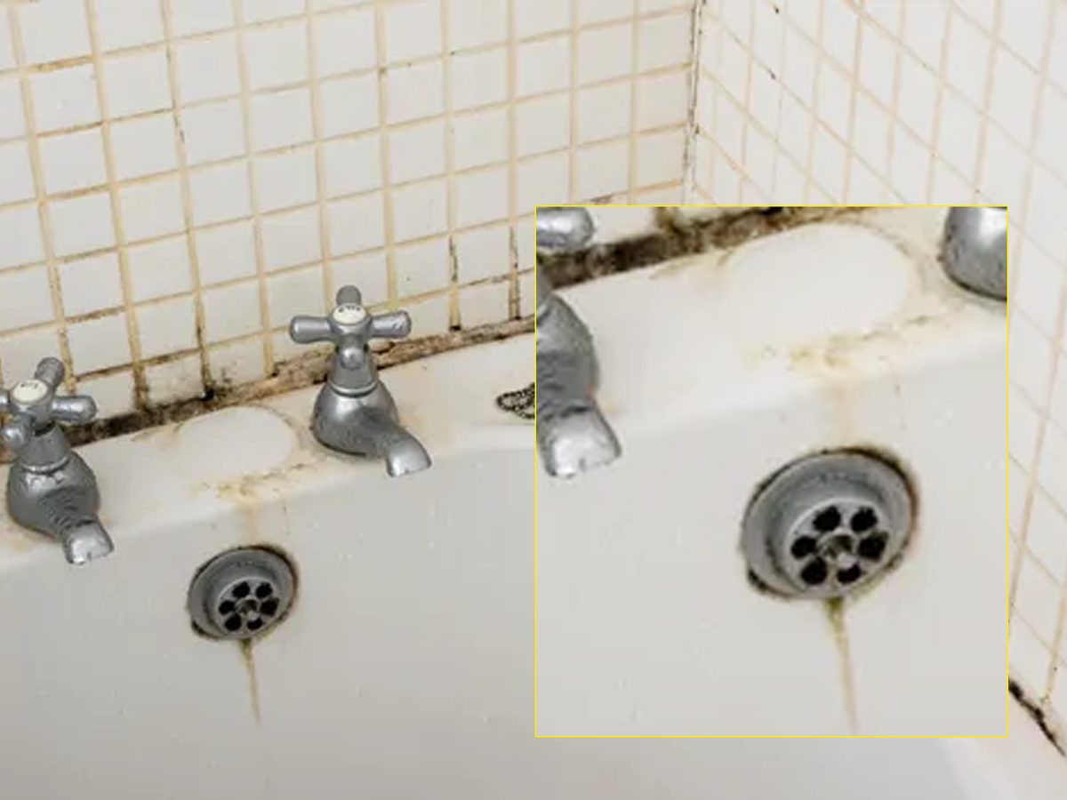 Nat dan permukaan kamar mandi yang menghitam karena jamur